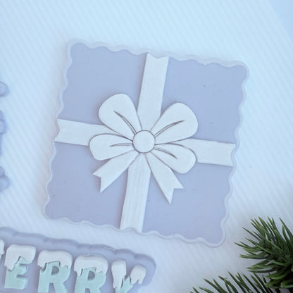 Present box with bow image 0