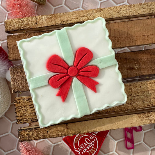 Present box with bow image 0